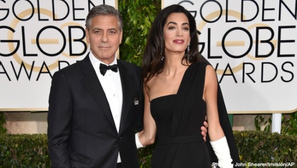 George Clooney com sua esposa Amal Amal (photo by John Shearer/ Invision/AP)